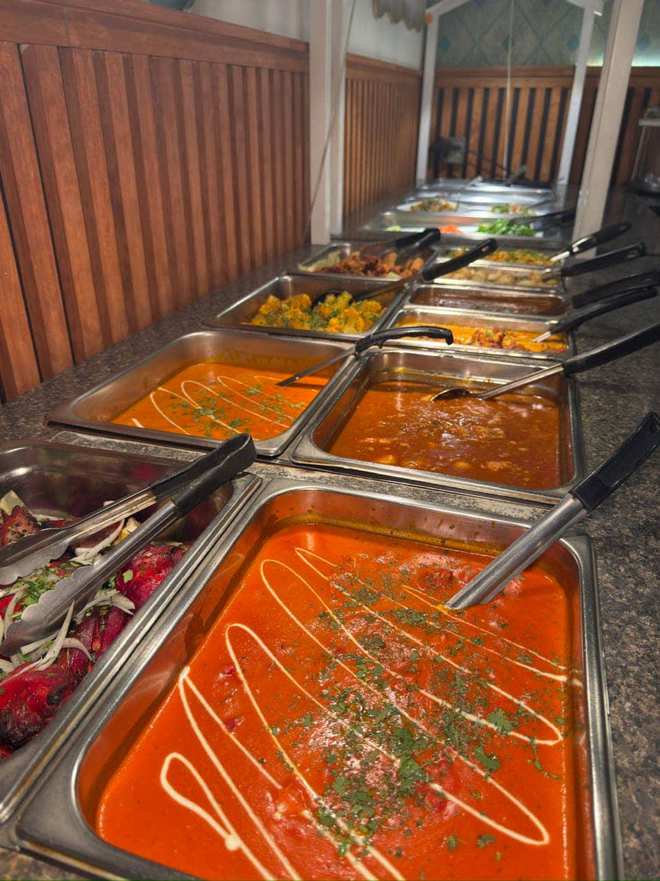 Indian dishes prepared in the Jewel of India kitchen for a catering order